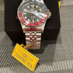 Invicta Pro Diver Silver Watch with Red and Blue Accents